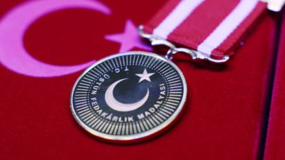 Katipoğlu'na Devlet Üstün Fedakârlık Madalyası Takdim Edildi