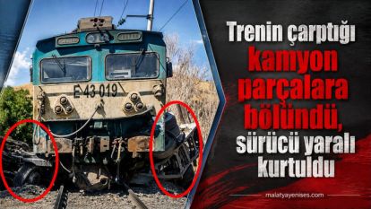 Trenin çarptığı kamyon parçalara bölündü, sürücü yaralı kurtuldu